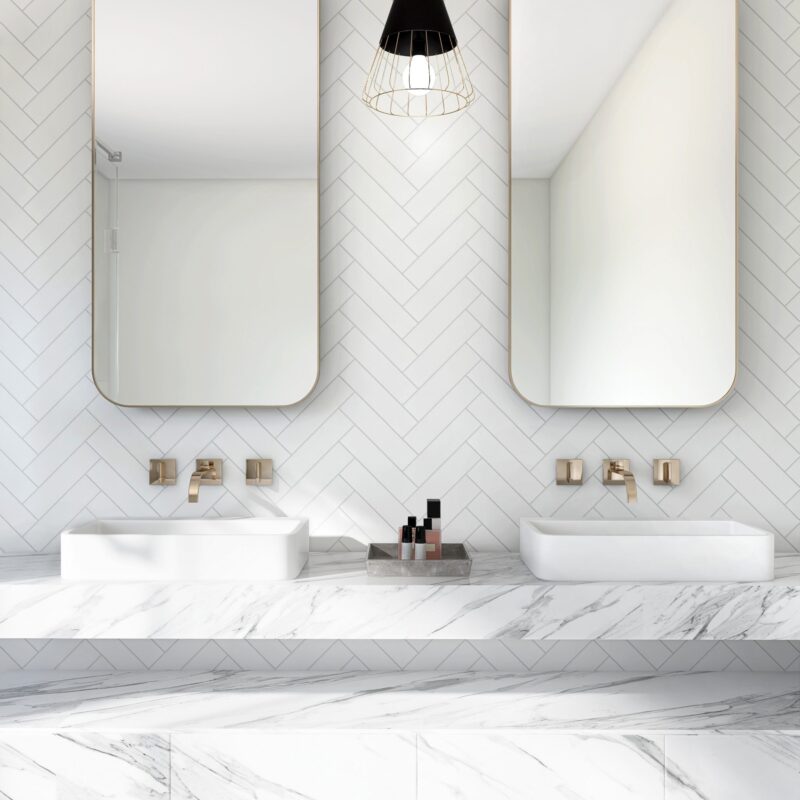 Room scene of UMORE Classico White Porcelain Herringbone Mosaic Tile installed on the wall